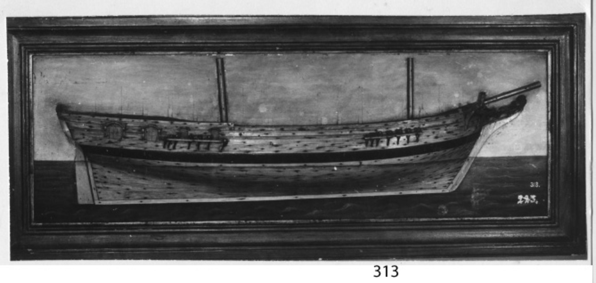 Fartygsmodell blockmodell styrbordssidan av briggen Skirner, insatt i ram, av trä, fernissad.