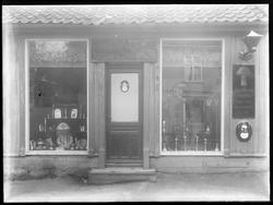 Jacobsens kobber- og tinnutsalg,  reklame for OSRAM
Lampesk