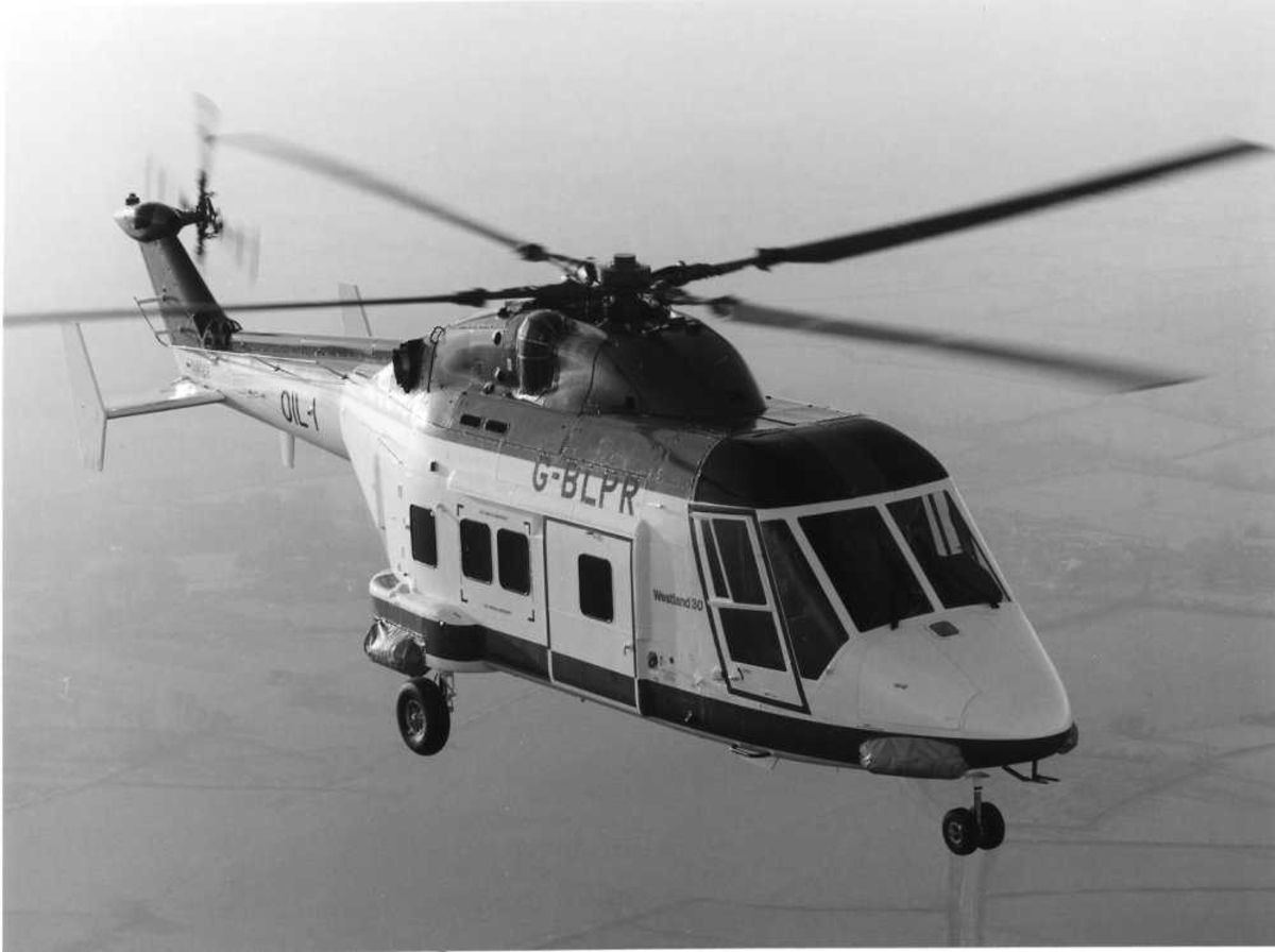 Ett helikopter i luften. Westland 30-160, G-BLPR (OIL 1)