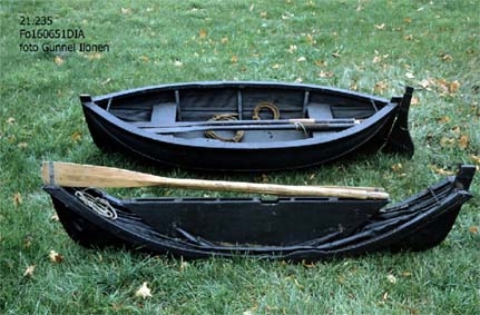 The small collapsible dinghies are sometimes called Berthon boats after their inventor and designer, the English vicar E. L. Berthon. The idea of this type of boat came to him after a maritime disaster when the steamer Orion foundered in 1849 and 150 people perished. He wanted to create a life boat that was simple to use and easy to stow aside. Ordinary life boats were bulky, and the area they occupied could be used as a promenade deck or for social activities. 

For submarines collapsible life boats were an excellent alternative, since they could easily be stored on board. Before these collapsibles were introduced, submarines used to have wooded life boats tied to ther deck, an unwieldy and impractical solutions.

The collapsible alternative to the wooden life boats are made of canvas treated with oil or paint to make it withstand water and wear. At the bottom are two board that fold against each other when the boat is not in use.

Due to the fragile nature of the canvas, the museum has chosen to keep one of the boats folded and the other unfolded.

The submarines to which they once belonged were name Hvalen (the Whale) and the Gäddan (the Pike). The Hvalen was the second submarine in the navy (the first was called Hajen, the Shark and was built at the Galärvarvet in great secrect and lanched in 1904). Submarine No. 2 Hvalen was built in La Specia in Italy in 1909. She took herself all the way from Italy to Sweden, by then the longest journey ever undertaken by a submarine. The Hvalen was decommissioned as early as 1919. 

The Gäddan was built at the Örlogsvarvet (the naval dockyard) in Karlskorna in 1915. For her day she was very advanced and could reach a depth of 35m. The Gäddan was taken out of service in 1935. 

Both dinghies were donated to the National Maritime Museum by the Stockholm naval dockyard in 1966.  