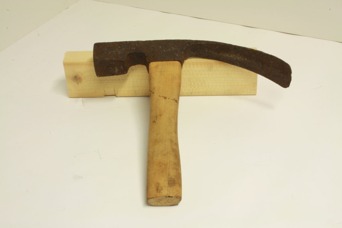 Avlangt hammarhode. kort skaft.