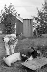 Landskap med person(er).