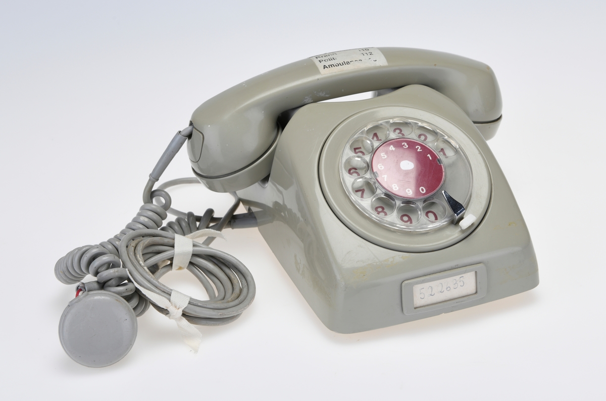 Bordtelefon/ hustelefon fra Elektrisk Bureau i standard, grå, farge.