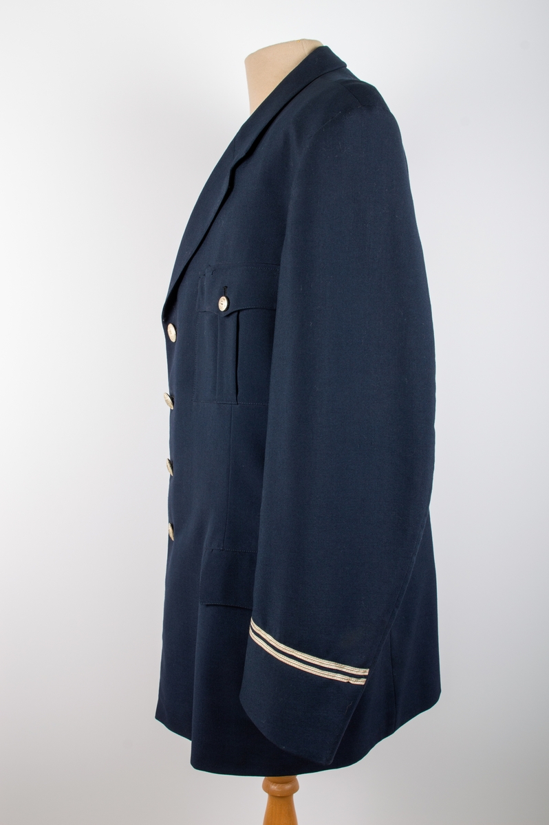 Uniformsjakke til overkonduktør i NSB (før 1969). En del av sommeruniformen.
Størrelse 52.