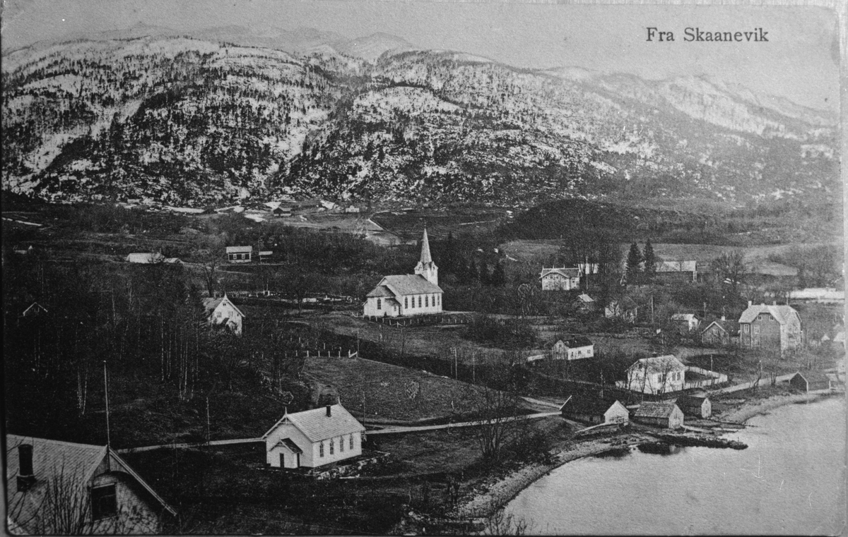 Postkort med landskapsmotiv frå Skånevik i Etne sett mot sørvest, ca. 1910.