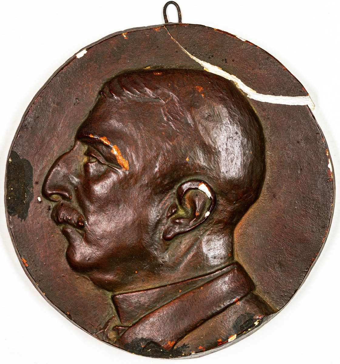 Porträttrelief föreställande Kamrer Adolf Bjuggren.