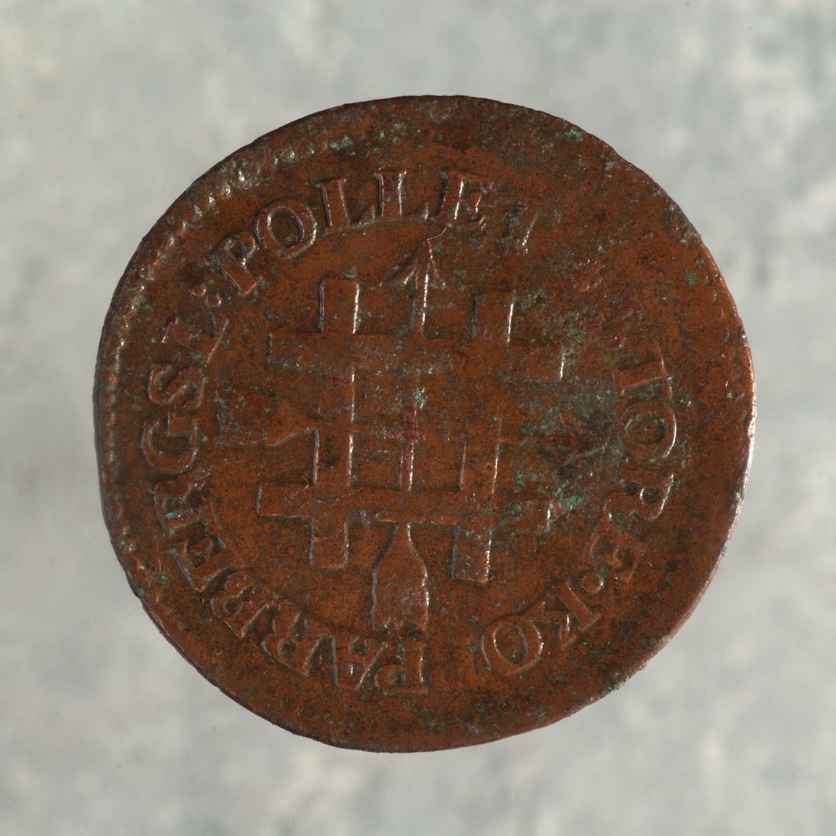 Mynt av kopparlegering. Stora Kopparbergs pollett. Slagen 1763 i Avesta.