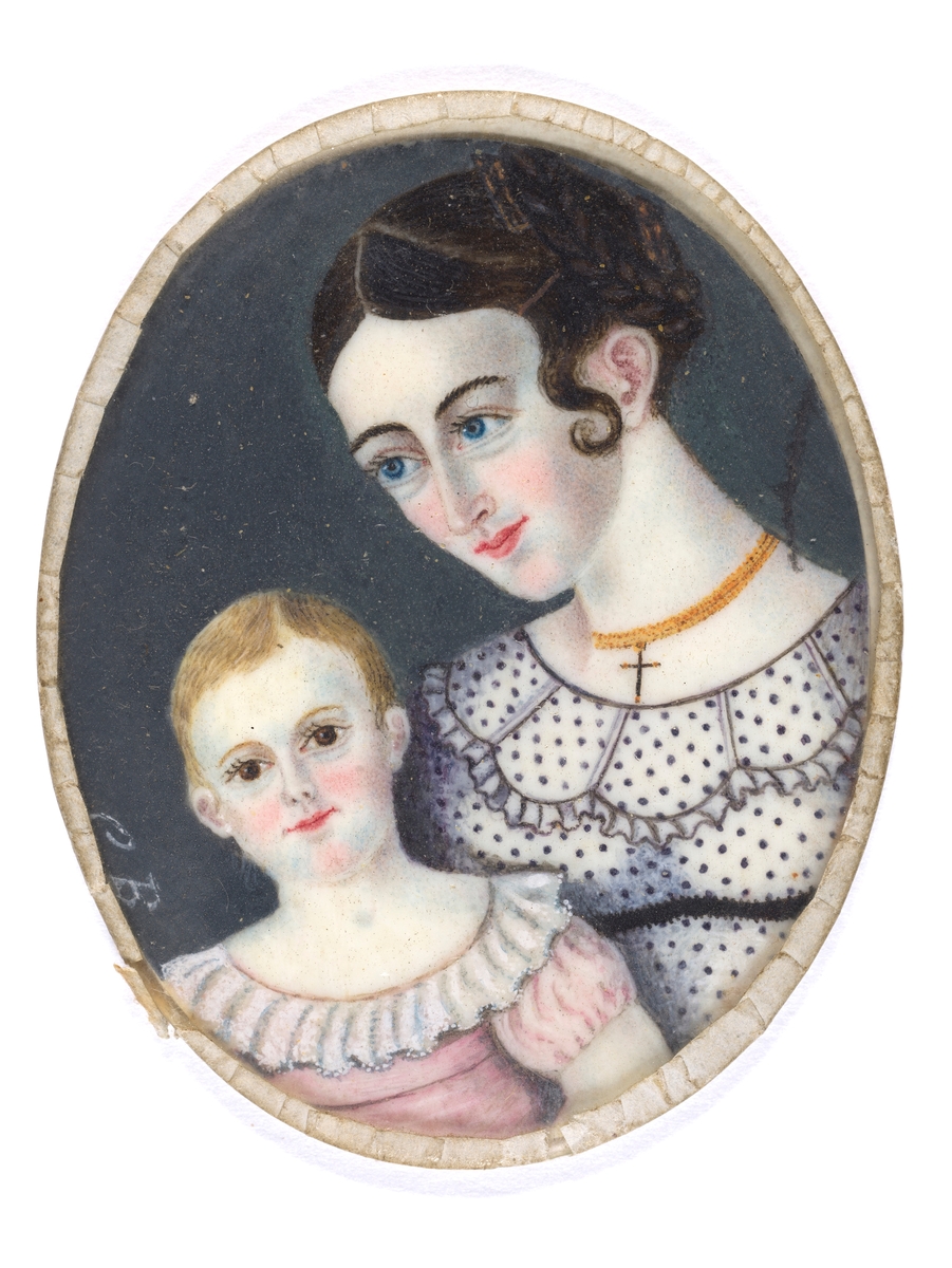 Brystbilde av kvinne med barn: Fru Herfort med datter.