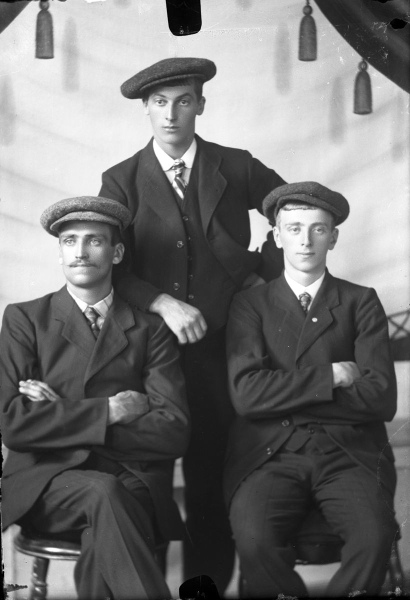 Portrett av tre menn