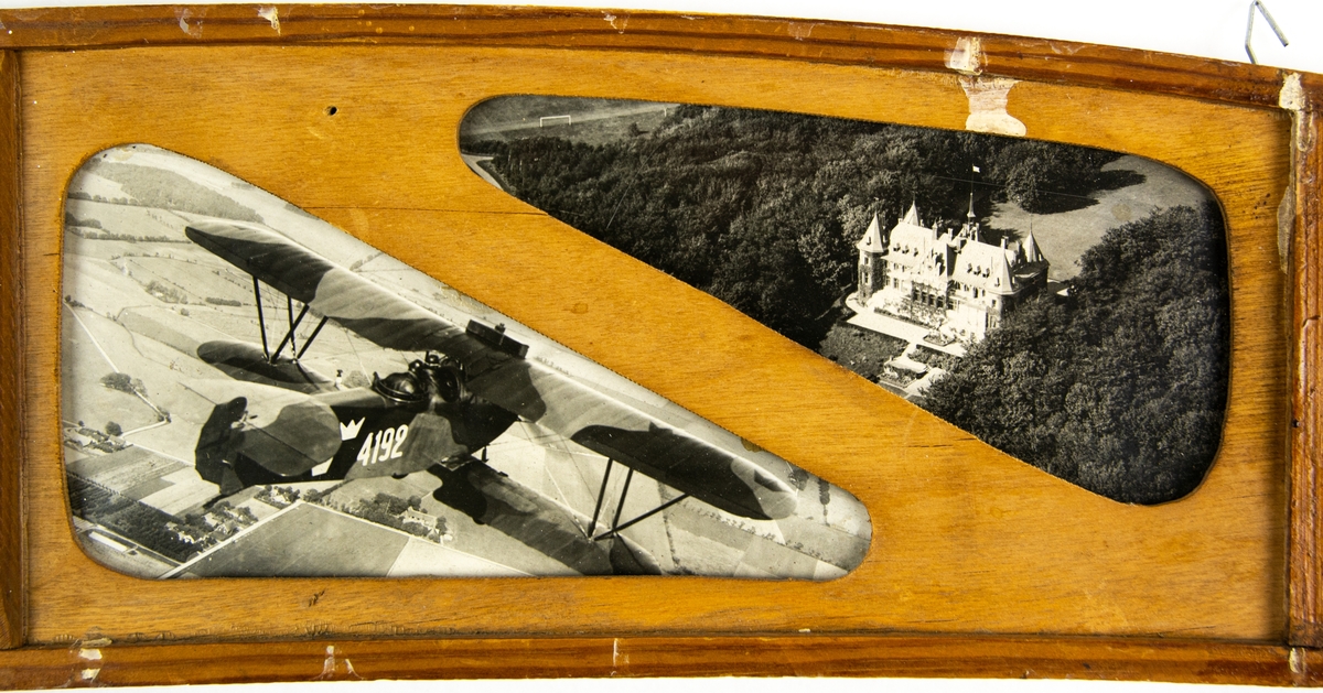 Fotografier inmonterade i en vingsprygel av trä.