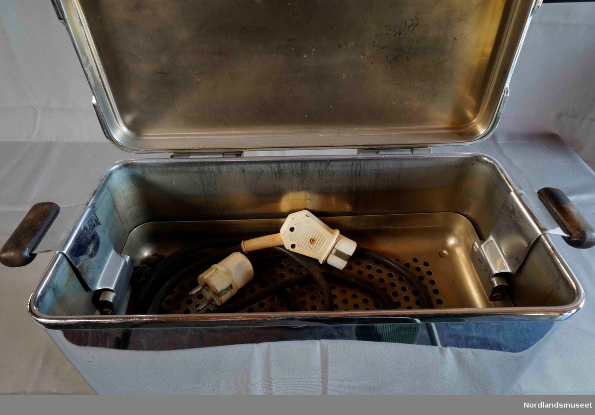Elektrisk kokeapparat brukt til desinfeksjon av utstyr.