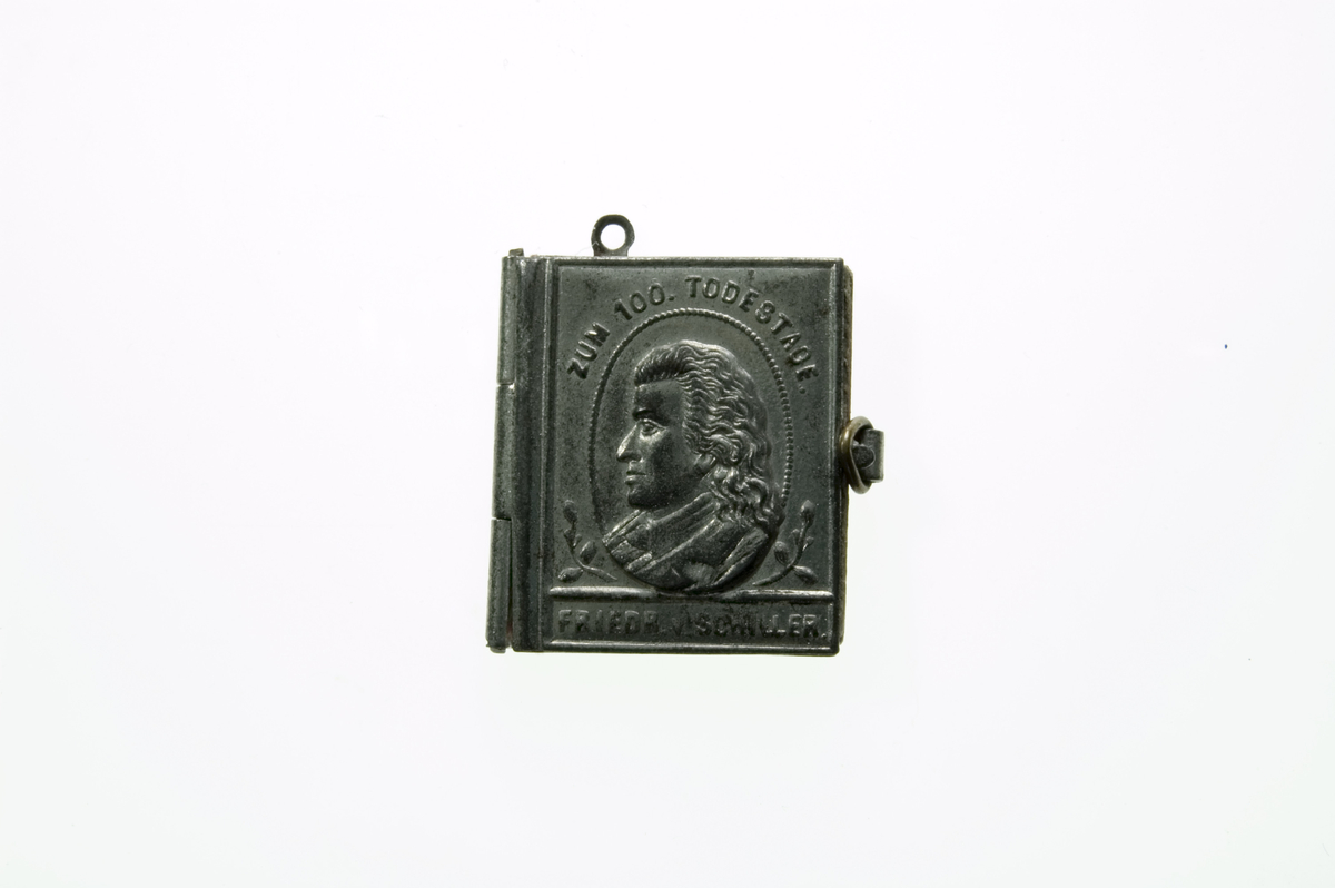 Motiv advers: I oval medaljong omgitt av ranker poeten Friedrich von Schiller, byste i profil mot venstre.

Motiv revers: Klokke.
