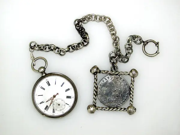 Pocket watch and chain.
