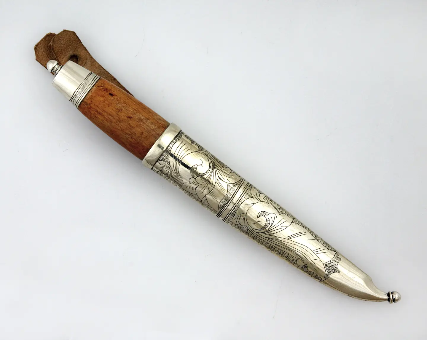 Knife by Nils Karl Magnus Karlsen with engravings.