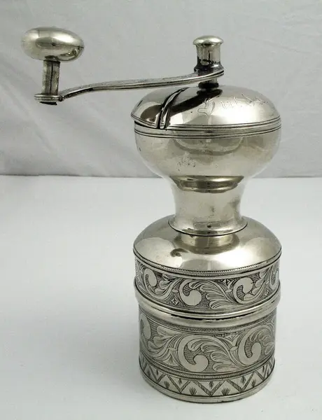 Aksel and Hulda Karlsen’s wedding gifts made in nickel silver: coffee grinder, 1920.