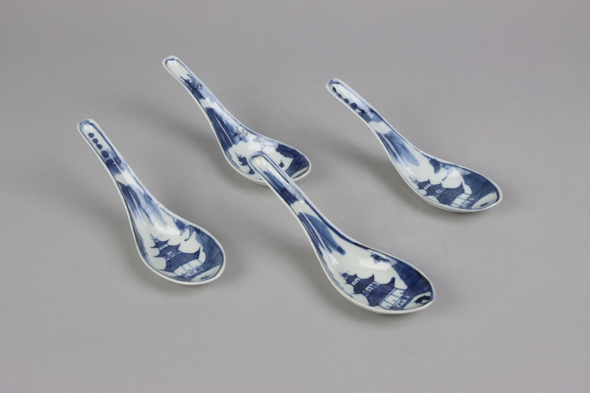 Modelled as a leaves. Bowl and handles are decorated  with Pagodas. All decor in blue underglaze. Backside with no decorations.