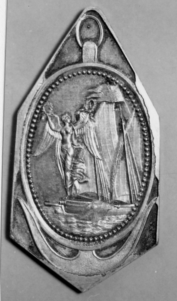 Åtsidan: Medaljong vilande på ett ankare, med Fredsgudinnan på en galär.
Frånsidan: Lagerkrans inom en  pärlkrans.