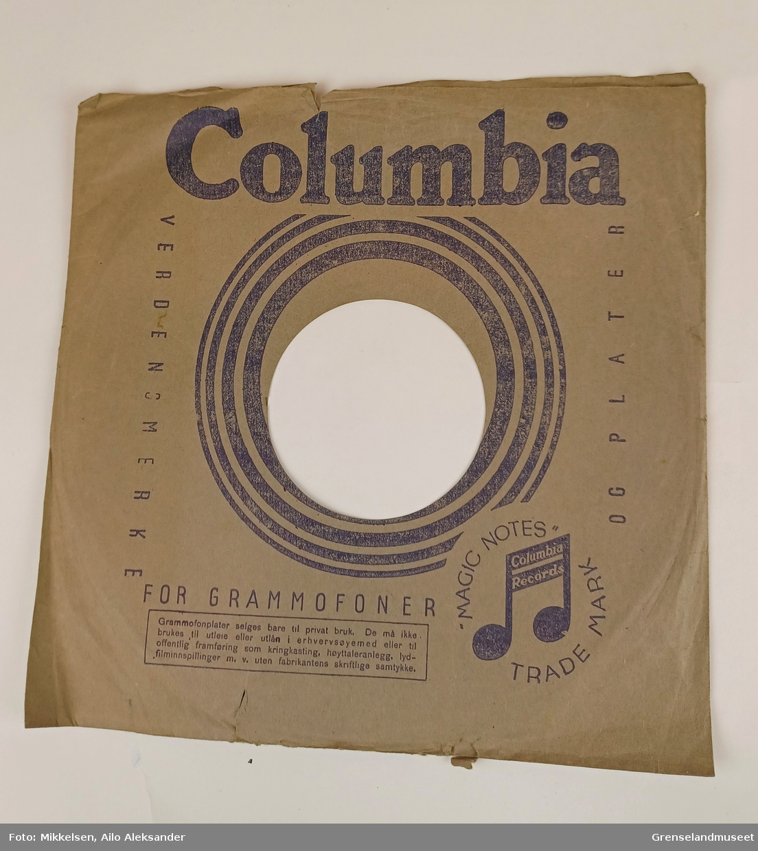 Plate: Columbia overskrift og illustrasjon. 
           Magic Notes logoen som er en note.
