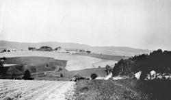 Hovin gård med kulturlandskap. Motivet er tatt fra Gardertop