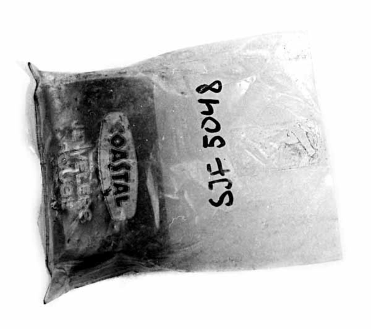 Brynet ligger i plastpose. Verktøy for kvessing av knivblad. 
Fra knivmakerverkstedet til Lutnes (1890-1975). 