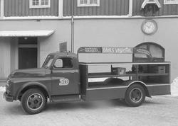 Kjøretøy fra E.C. Dahls Bryggeri ved Gamle Bybro.