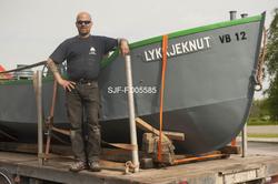 Varpebåten «Lykkjeknut» fra Sørlistøa fløtermuseum ved Osens
