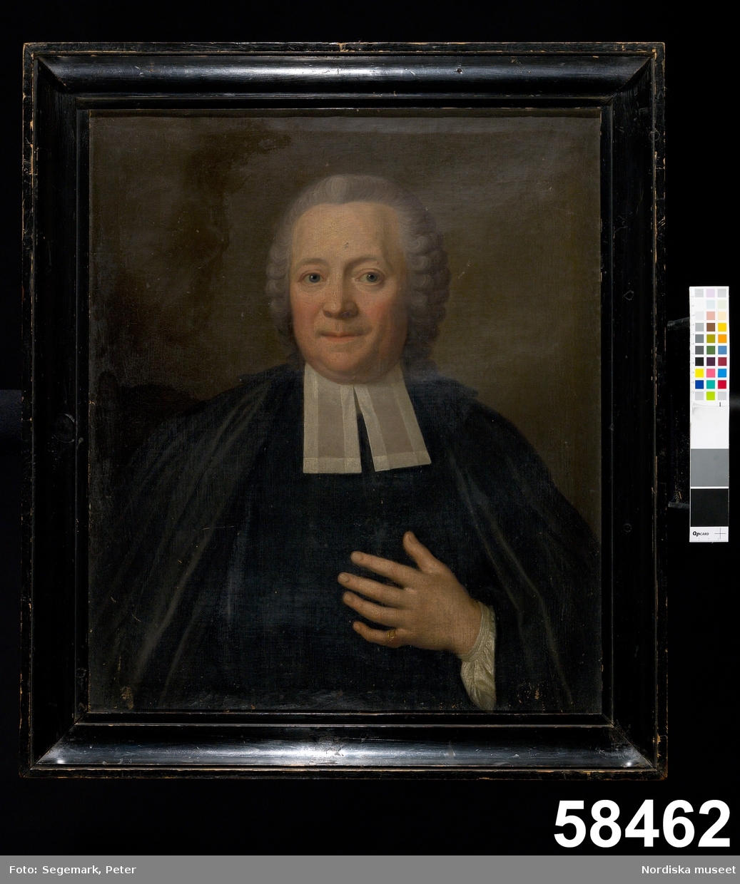 Mansporträtt: prästporträtt, midjebild, en face.