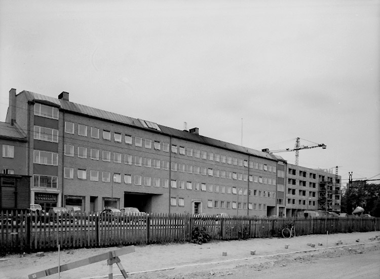 Tullhuset, exteriör. Södra Grev Rosengatan.
Till höger på bilden syns Hotell Grev Rosen under byggnation.