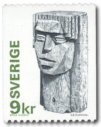 Flickhuvud, träskulptur 1922 av Bror Hjort.