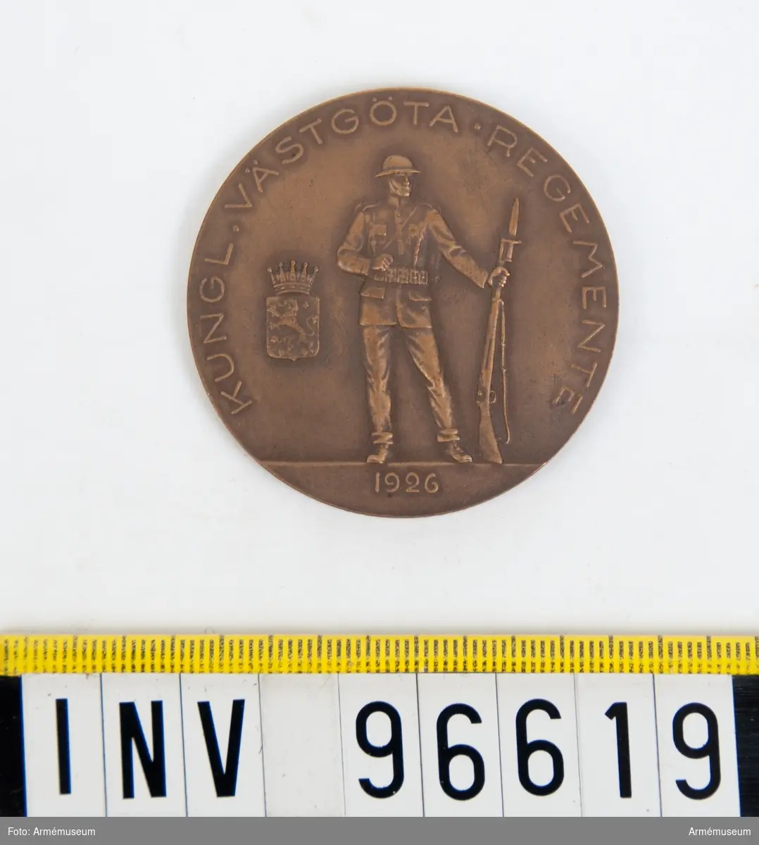 Medalj i brons för Västgöta regemente.
Stansar 3602-03.
Stansarna härdade 1926-08-13.