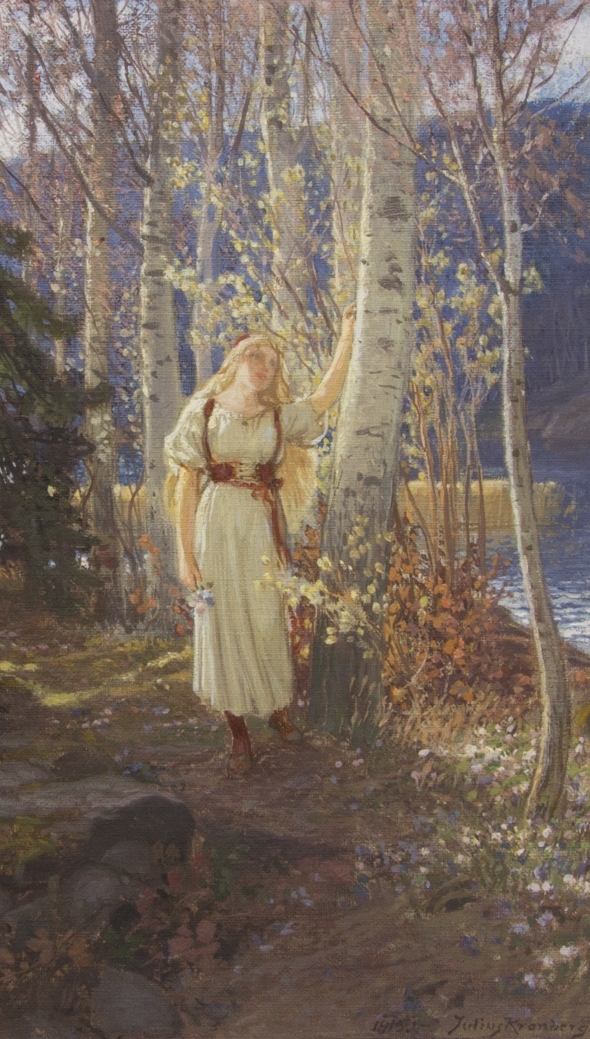 Ung flicka i helfigur som stödjer sig med en hand mot en björk i ett nordiskt landskap. Klädd i ljus klänning och rött liv. I andra handen håller hon en blombukett. I bakgrunden landskap med björkar och sjö.
