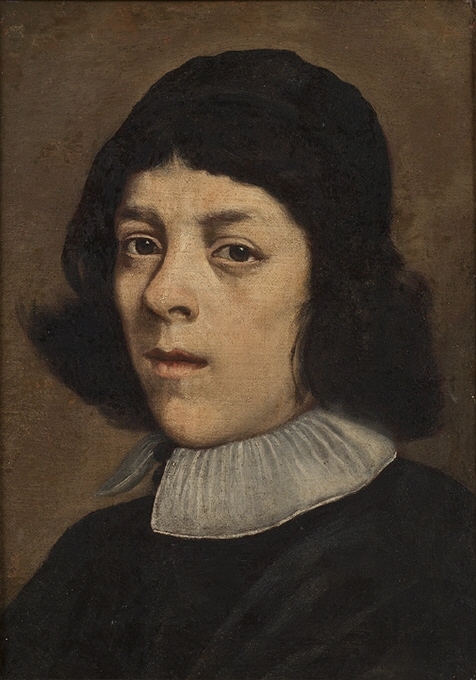 Porträtt av ung man med barett