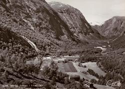 Postkort ";10/69"; med motiv fra en av gårdene på Finnset i 