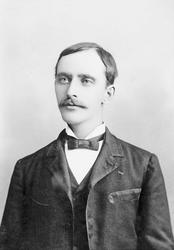 Portrett av en mann, klær.