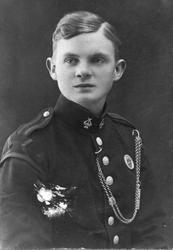 Studioportrett av en divisjonsmusiker.