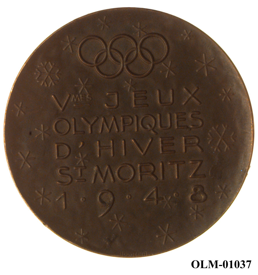 Inneholder 101 merker, pins og  medaljer.
Guttorm Berge tok tilbake samlingen 21.mai 1996.-notert i aksesjonsboken.