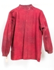 Ylleskjorta för dykare av röd vadmal. Knäppbar i hals och armlinningar.