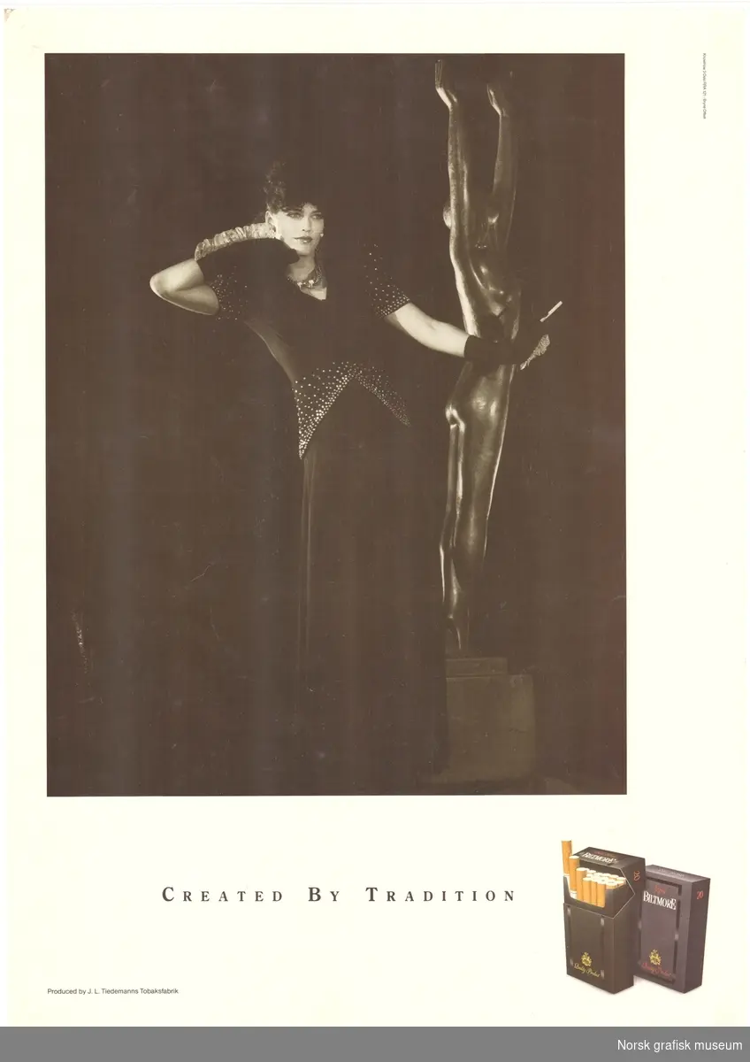 Reklameplakat for sigaretter av merket "Biltmore" fra J. L. Tiedemanns Tobaksfabrik.
Motiv i sort/hvitt, en kvinne kledd til fest ved siden av en skulptur.
Tekst: "Created by tradition".