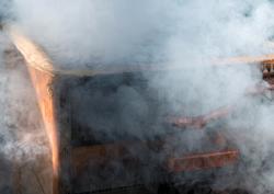 Detalj av røykeovn på Norsk Skogmuseums varmrøykingsanlegg f