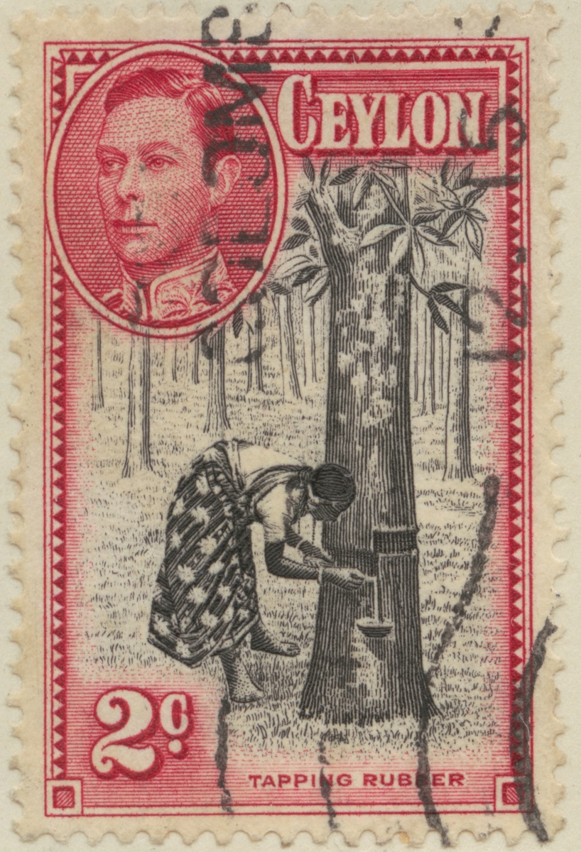 Frimärke ur Gösta Bodmans filatelistiska motivsamling, påbörjad 1950.
Frimärke från Ceylon, 1938. Motiv av Tappning av gummiträd. T.v. Kung George VI.