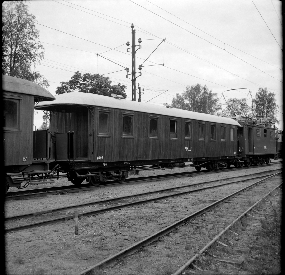 Nordmark - Klarälvens Järnväg, NKIJ personvagn 1001 på bangården i Nordmark.