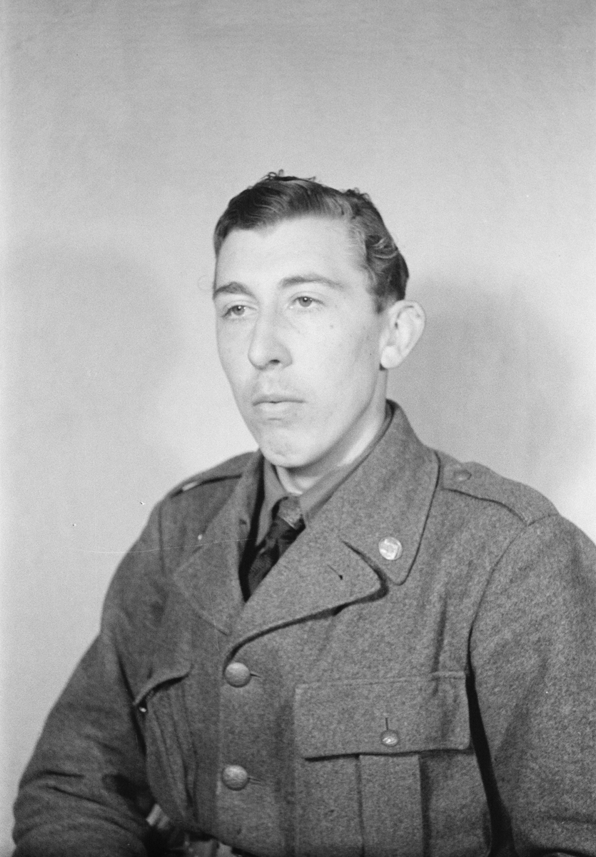 Porträttfoto av oidentifierad soldat vid F 19, Svenska frivilligkåren i Finland under finska vinterkriget, 1940.