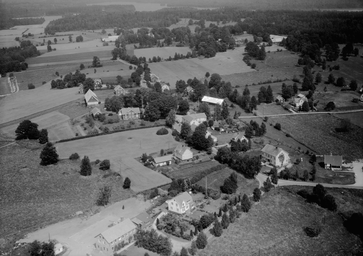 Flygfoto över Dannäs i Värnamo kommun, Jönköpings län. 1130/1963