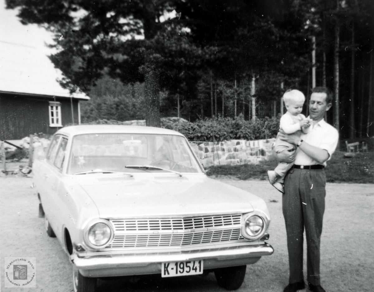Theodor Werdal og Vidar Fjellestad og Opel. Grindheim Audnedal.
Bilen:  Opel Rekord modell A, årsmodell 1963-65.