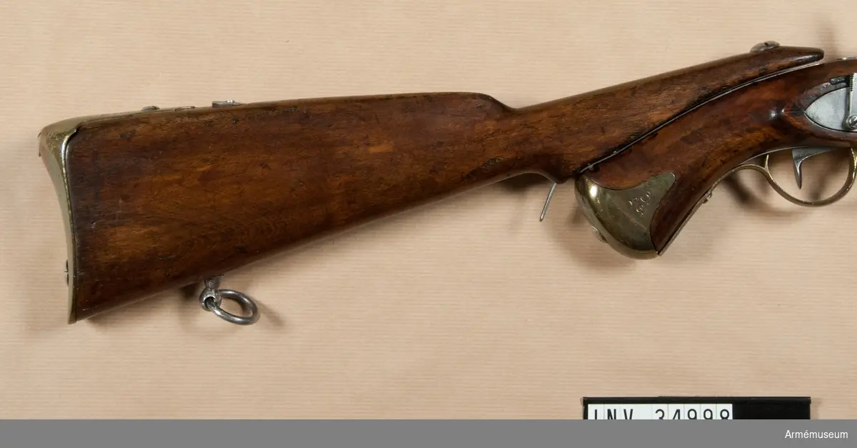 Grupp E III c.
Löskolv till tappstudsarepistol m/1820-49 med slaglås.
LITT  Alm: Arméns eldhandvapen, tab. 5:21.