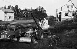 Kjøretøyer og anleggsmaskiner ved St. Olavsgate. Harstadgård