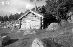 Ei smie på Jenstad gård i Sunndal kommune. Smia er av laftet