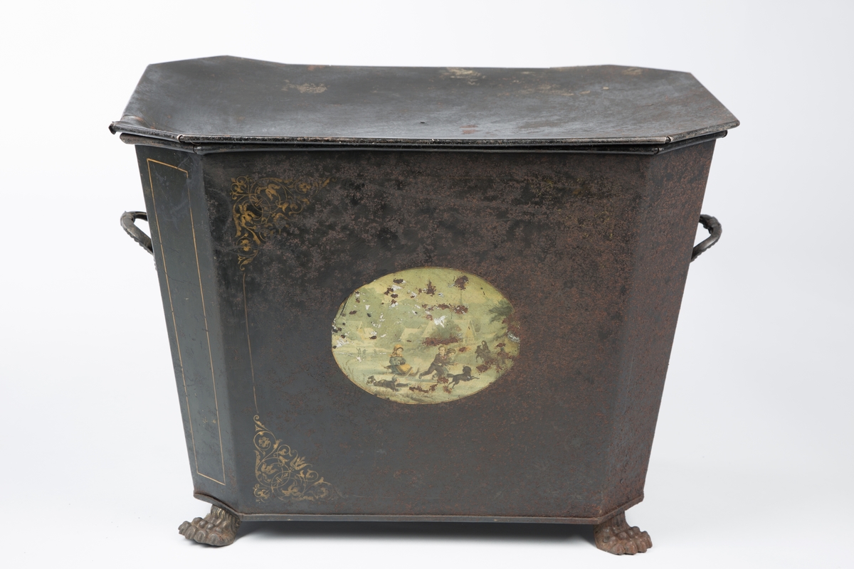 Liggende, ovalt motiv av lekende barn i vinterlandskap.