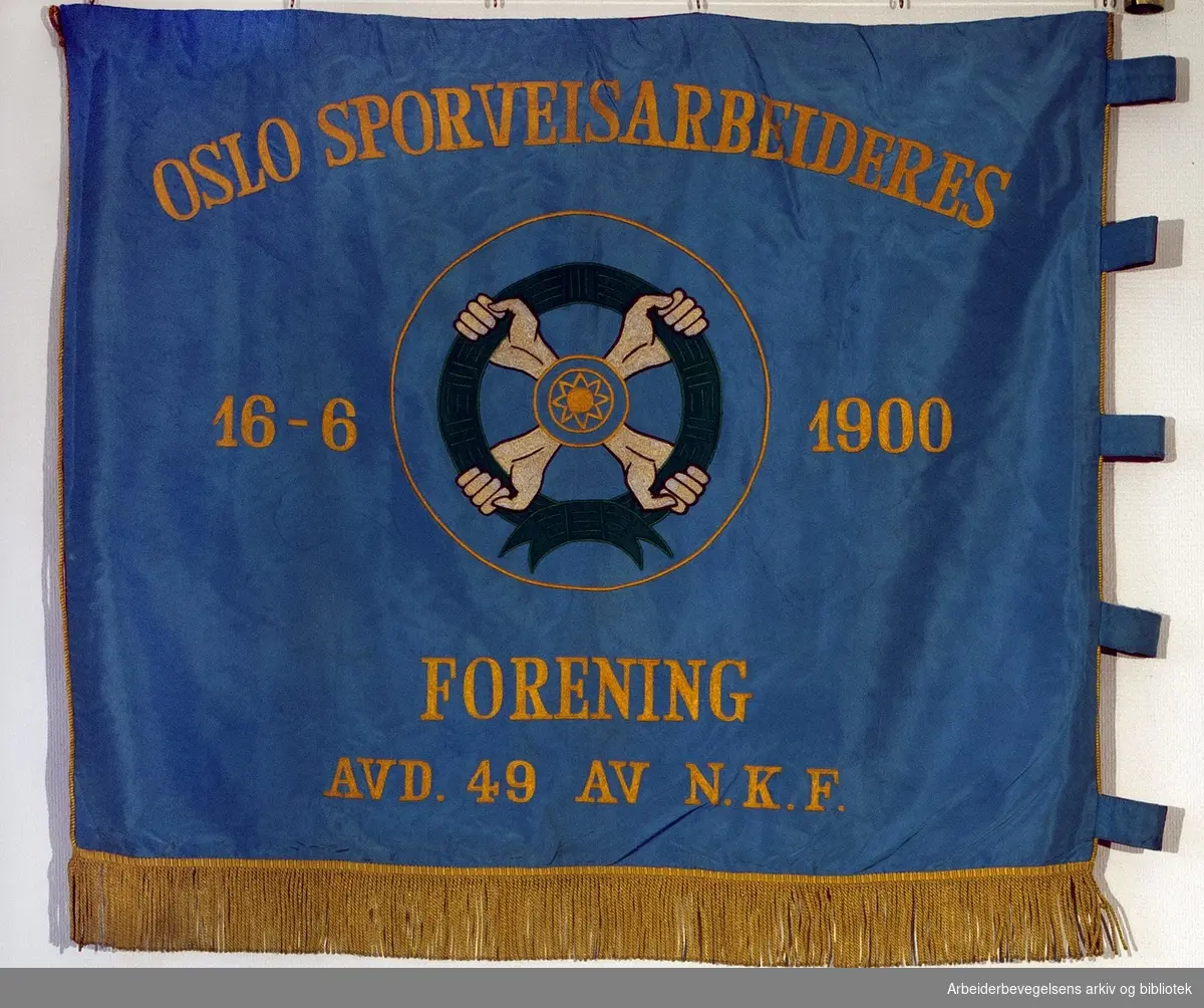 Oslo sporveisarbeideres forening.Stiftet: 16. juni 1900..Bakside..Fanetekst: Oslo sporveisarbeideres forening.16. juni 1900.avd 49 av NKF