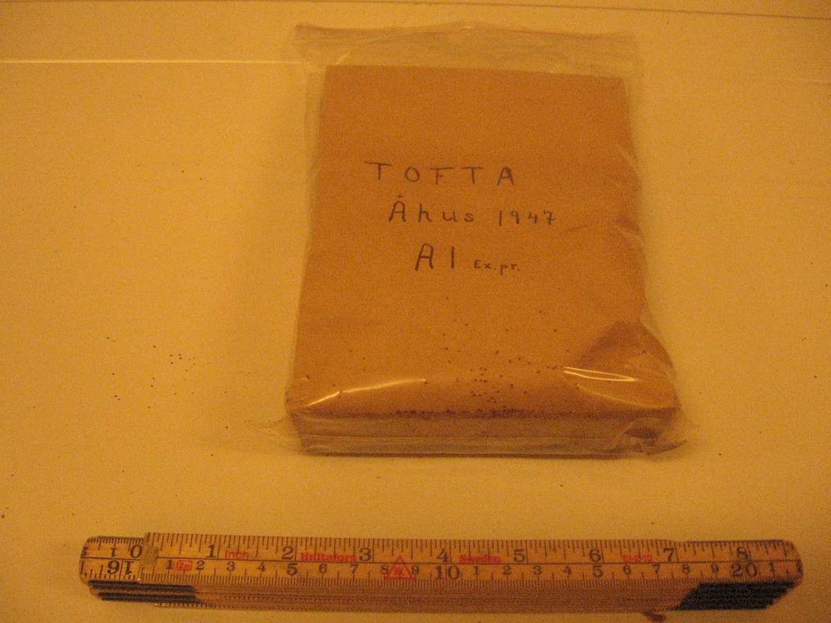 Brun papperspåse med tobaksfrön från Tofta, Åhus.